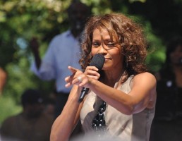 "Flickr Whitney Houston performing on GMA 2009 7" by Asterio Tecson - Flickr: Whitney Houston - Central Park, NYC September 1, 2009. Licensed under CC BY-SA 2.0 via Wikimedia Commons 