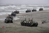 Russian marines take part in the landing operation during the strategic military exercises at the Khmelevka training range in the Kaliningrad region on the Baltic Sea in 2009. More recently, in October 2016, Russian forces deployed nuclear missiles as part of a military exercise. Photo by UPI/Anatoli Zhdanov | License Photo