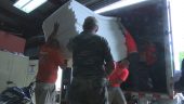 Emergency Commission staff load supplies for delivery to northern Costa Rica today.