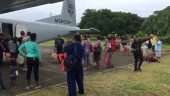 Residents of remote areas in the northern Costa Rican Caribbean are escorted to safe areas by plane in advance of Hurricane Otto.