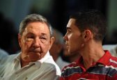 Current Cuban leader, Raul Castro, talks with Elian Gonzalez.