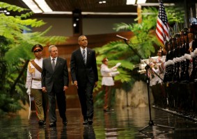 U.S. President Barack Obama and Cuba's President Raul Castro walk past honor guards during their first meeting on the second day of Obama's visit to Cuba, in Havana March 21, 2016.     REUTERS/Carlos Barria