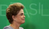Brazil's President Dilma Rousseff smiles as she attends a meeting with jurists at Planalto Palace in Brasilia, Brazil, March 22, 2016. REUTERS/Adriano Machado