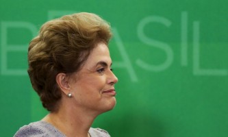 Brazil's President Dilma Rousseff smiles as she attends a meeting with jurists at Planalto Palace in Brasilia, Brazil, March 22, 2016. REUTERS/Adriano Machado