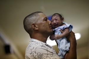 Microcephaly is a birth defect which causes babies to be born with unusually small heads and brains. (Photo by Ueslei Marcelino/Reuters)