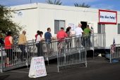 People wait in line to vote early at Downtown Summerlin on October 26, 2016 in Las Vegas, Nevada. Voters in Clark County are voting early at a record pace this year ahead of the November 8 general election. Ethan Miller/Getty Images